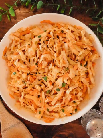 a bowl of bbq coleslaw with shredded cabbage.