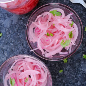 Pickled red onions in jars.