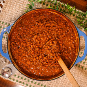 baked beans with ground beef in a skillet.