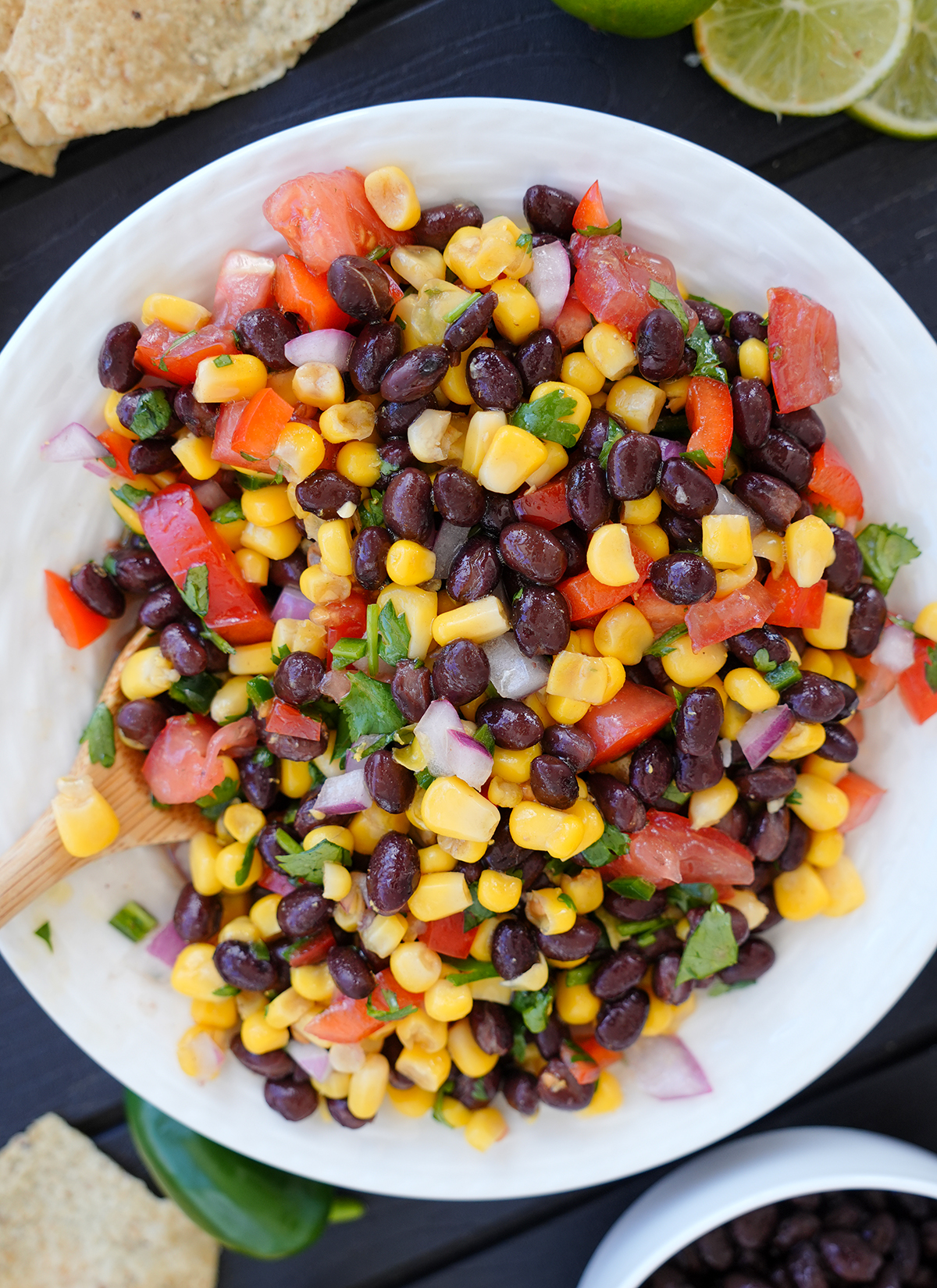 black bean corn salsa dip with fresh vegetables.