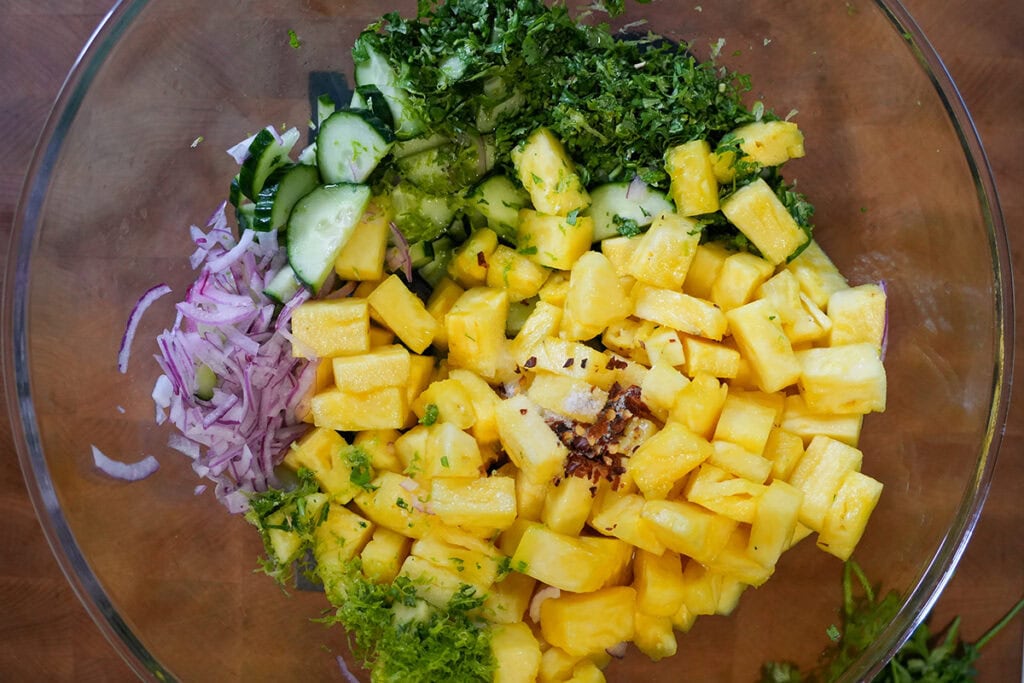 Ingredients separated in a bowl for the salad.