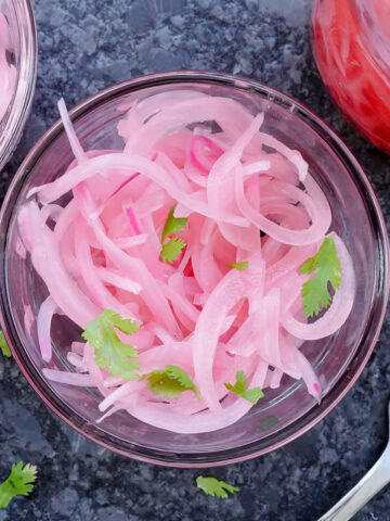pickled onions in a mason jar.