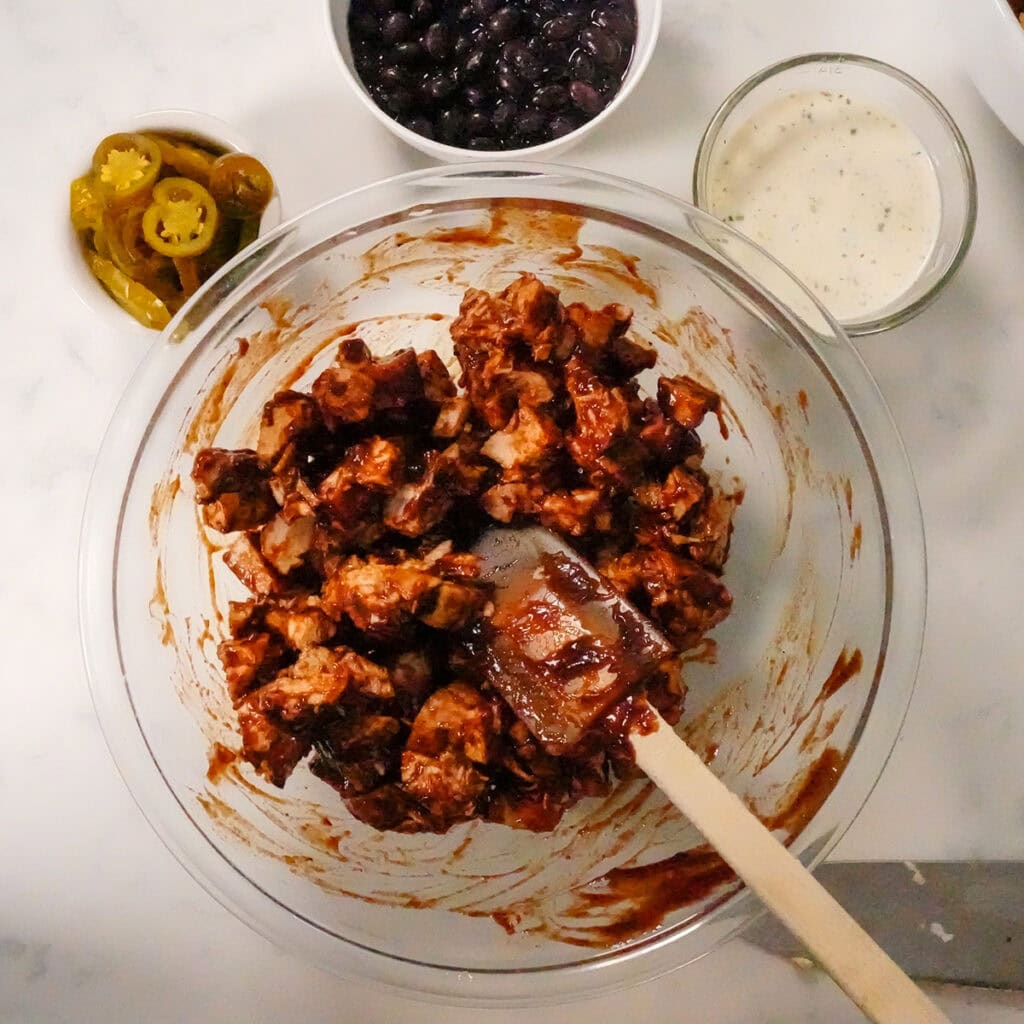 chicken tossed in bbq sauce.