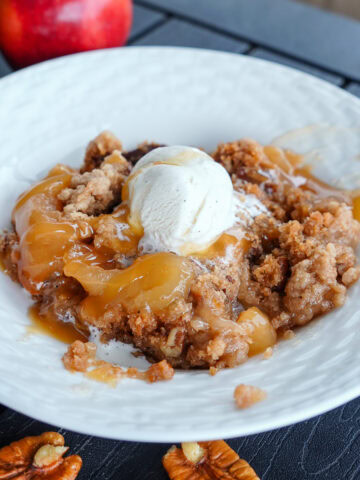 slow cooker apple dump cake with ice cream.