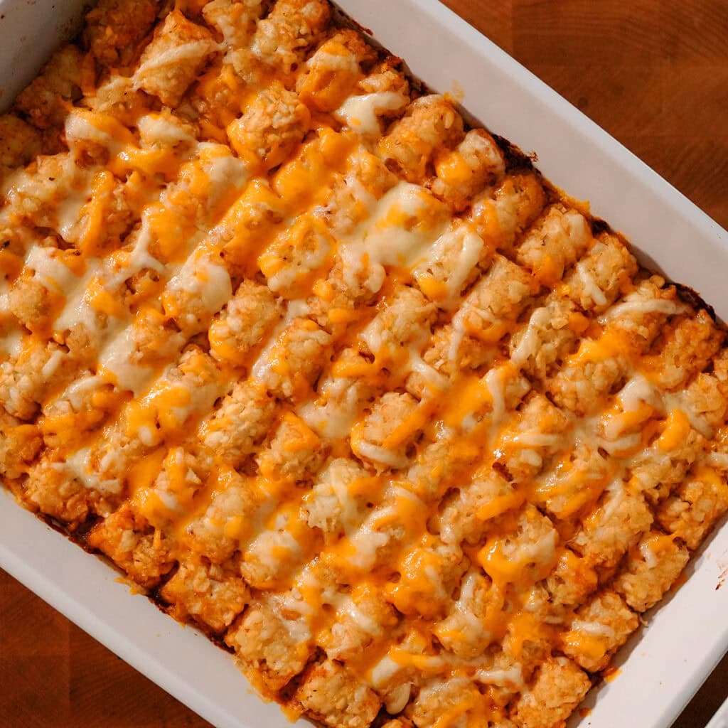 A baked casserole in a white dish.