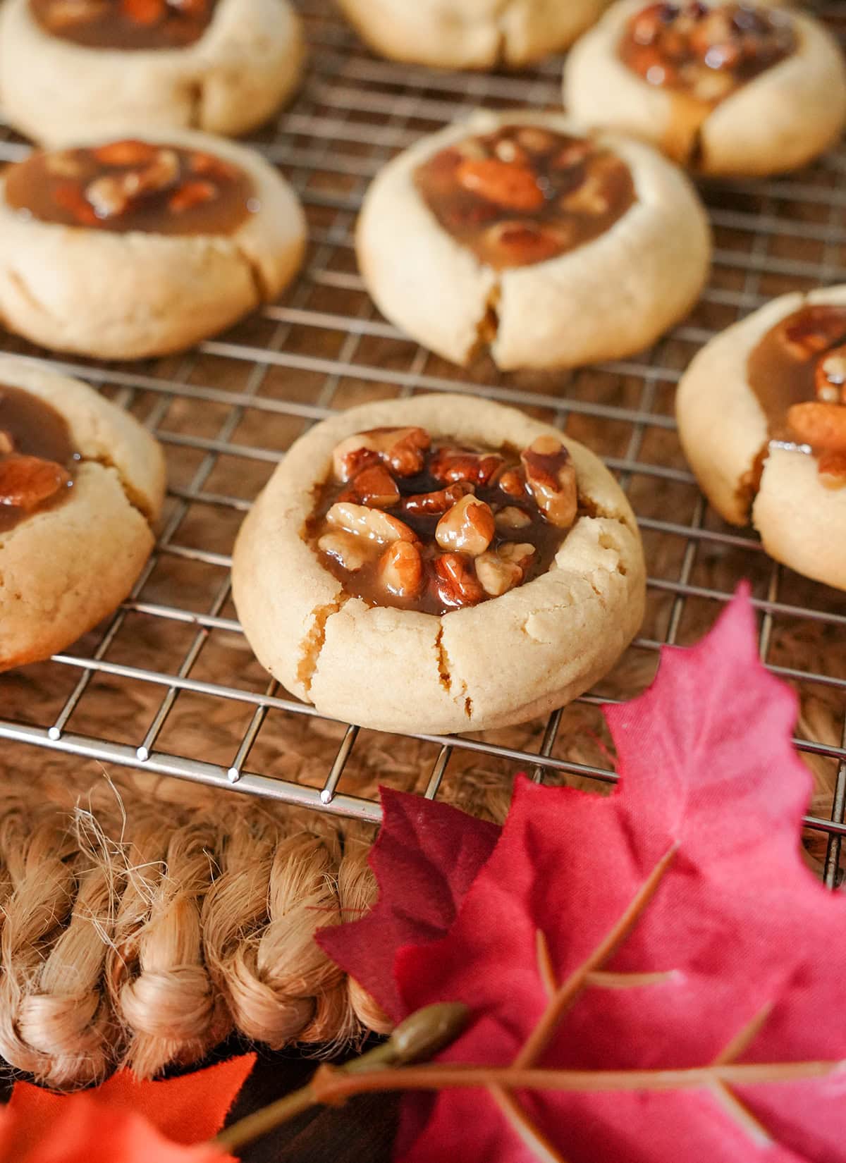 pecan pie cookies on a cooling rack.