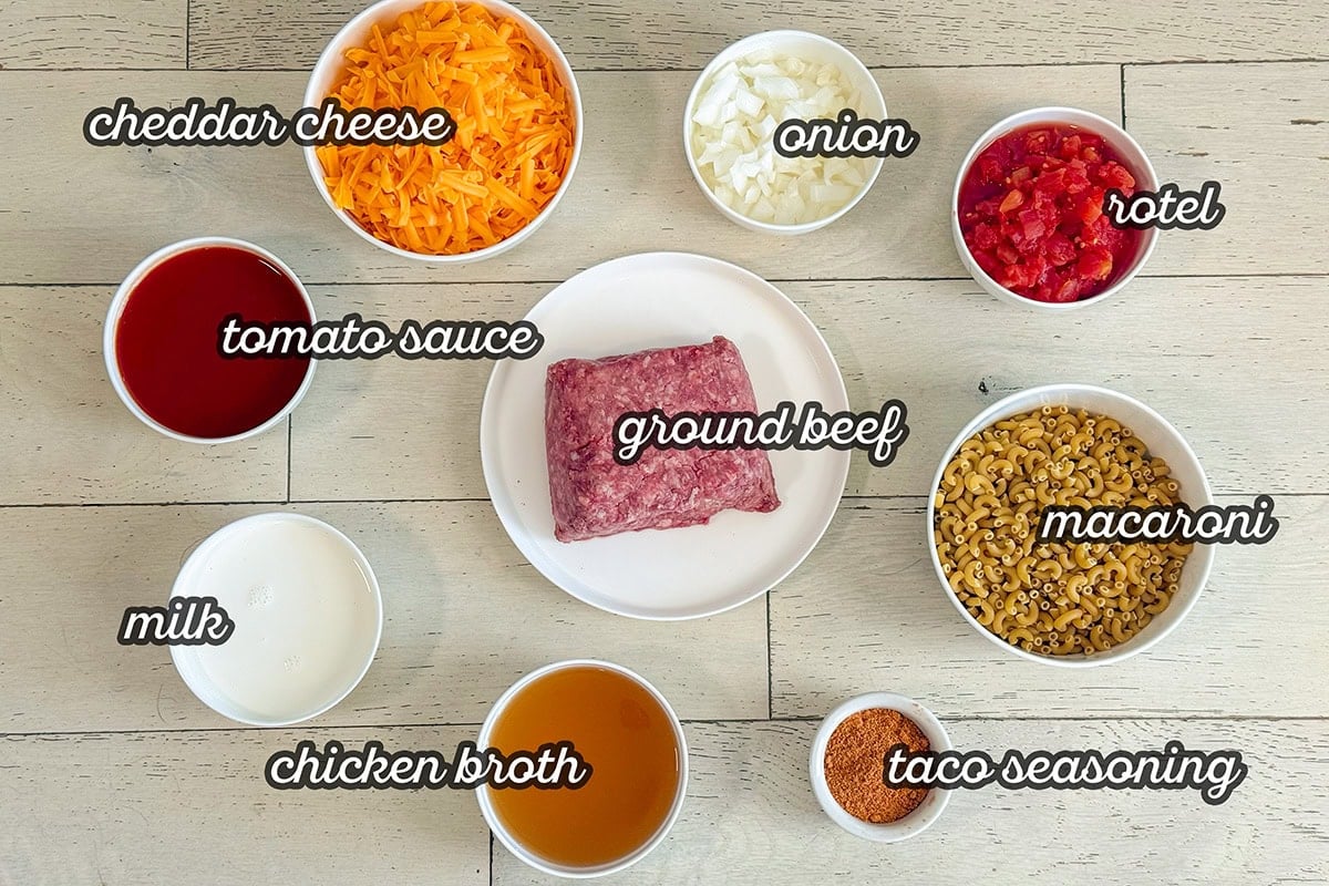 ingredients in bowls for making a taco Mac and cheese skillet.