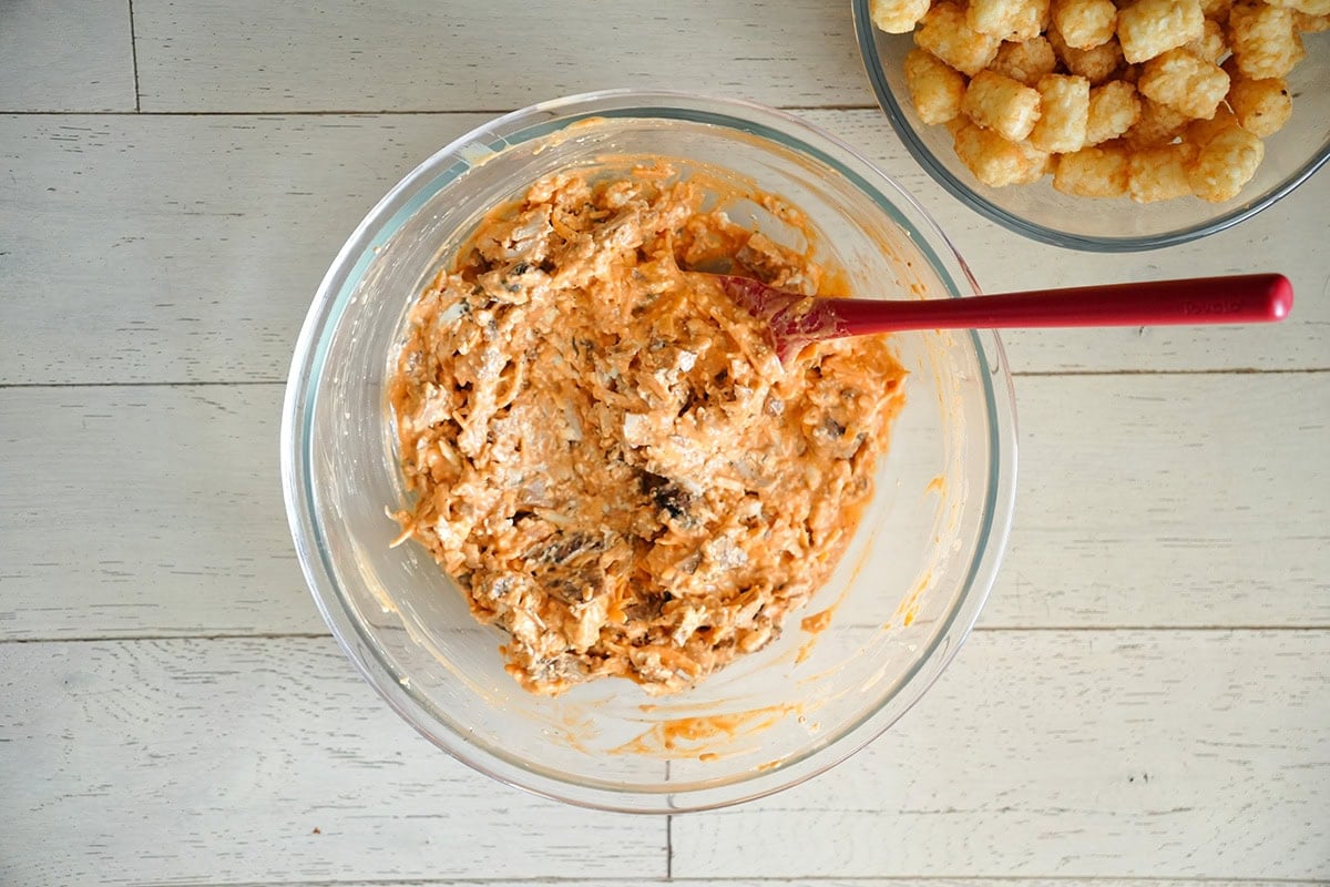 buffalo chicken mixture with sauce and cheeses.