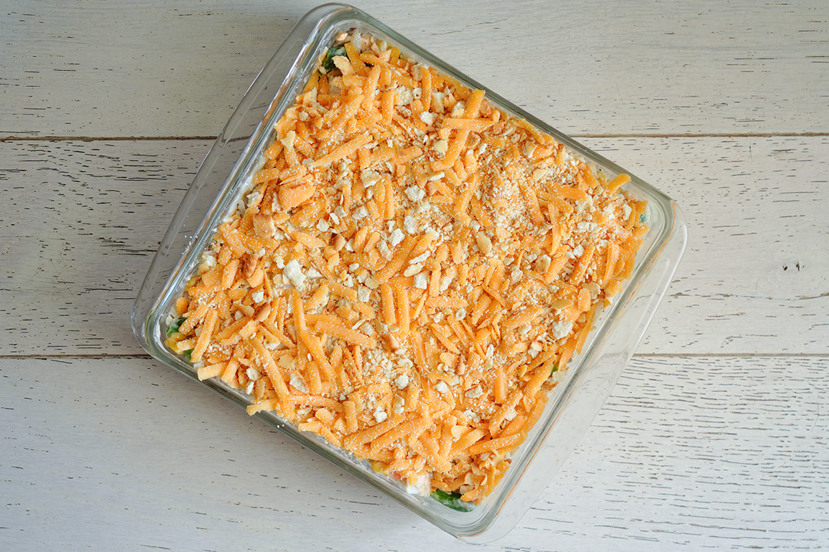 casserole dish with chicken, hash browns and vegetables.