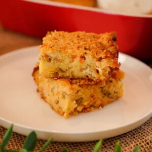 cornbread dressing cut into squares.