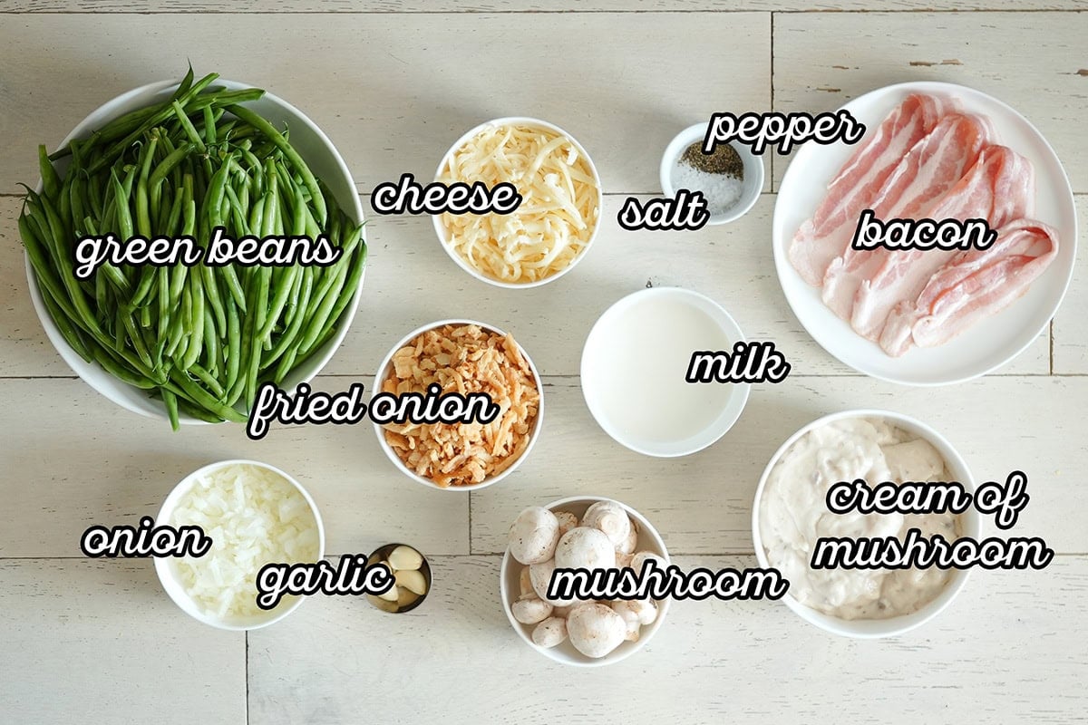 labeled ingredients for making a fresh green bean casserole.