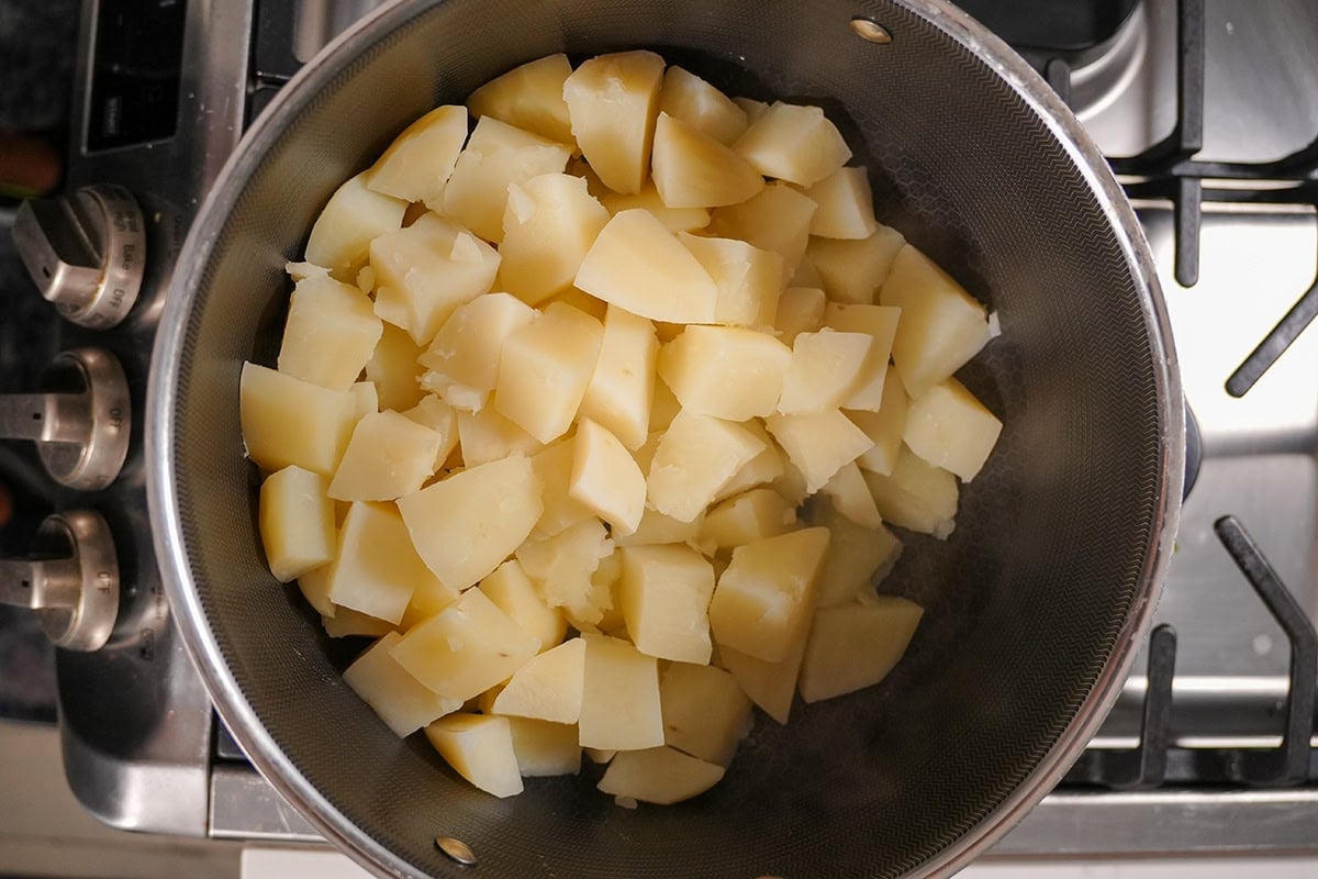 softened potatoes in a stock pot with no water.