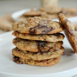 oatmeal cookies with chocolate chunks in a stack.